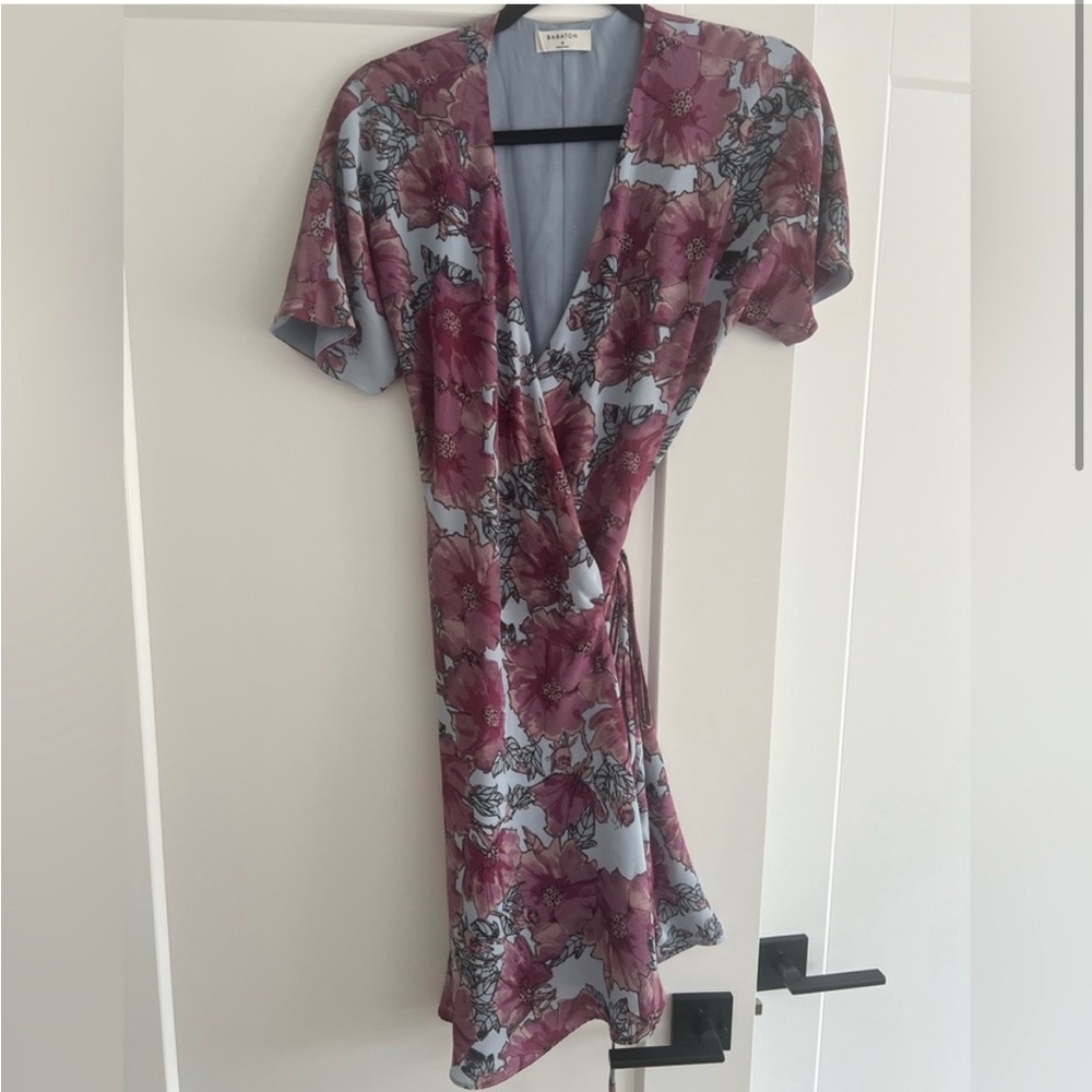 Beautiful Babaton wrap dress. Fits medium and large. Gently used